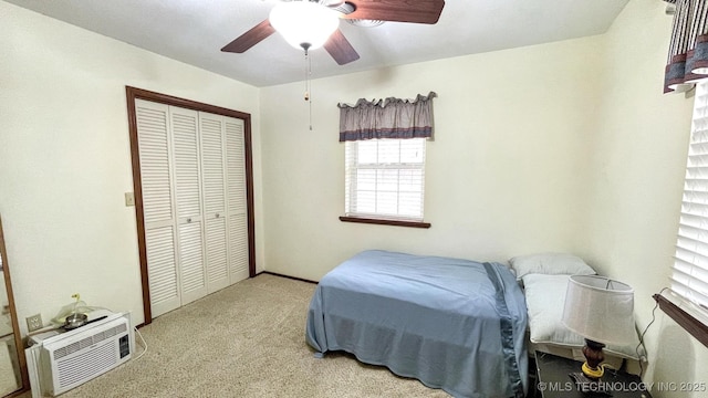 96848 S 4510th Rd, Vian, OK 74962 - bedroom with carpet flooring, a closet, a ceiling fan, and a wall mounted AC