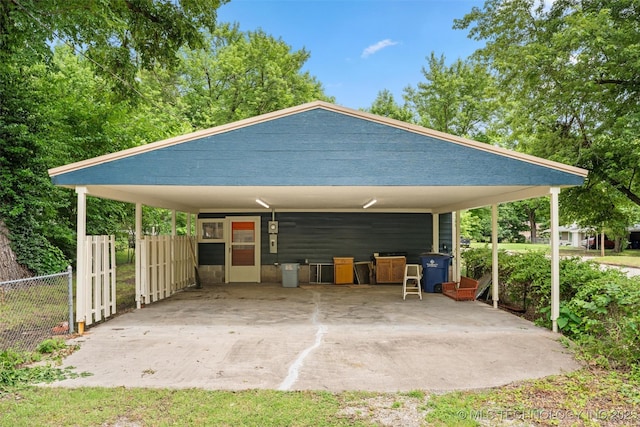 501 W 17th St, Pawhuska, OK 74056 - view of parking / parking lot featuring a carport