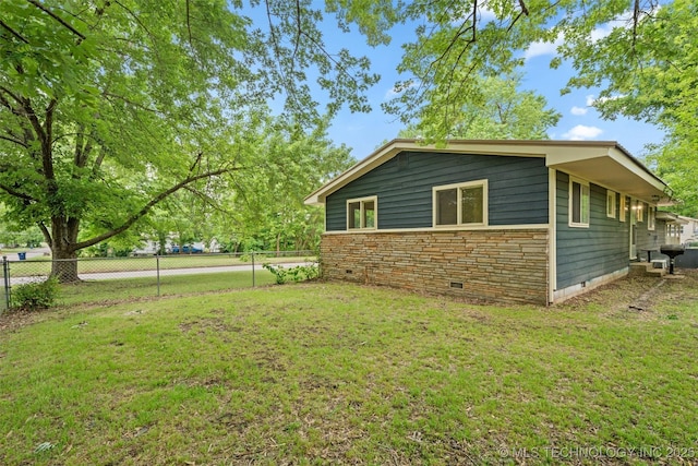 501 W 17th St, Pawhuska, OK 74056 - view of side of property featuring crawl space and stone siding
