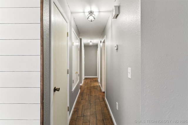 hall featuring dark wood-type flooring