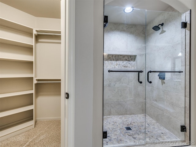 bathroom featuring walk in shower