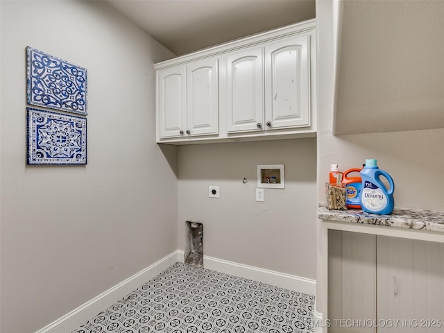 laundry room with gas dryer hookup, hookup for a washing machine, cabinets, and hookup for an electric dryer