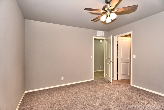 unfurnished room with carpet floors and ceiling fan