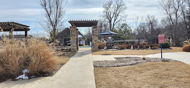 view of playground featuring a pergola