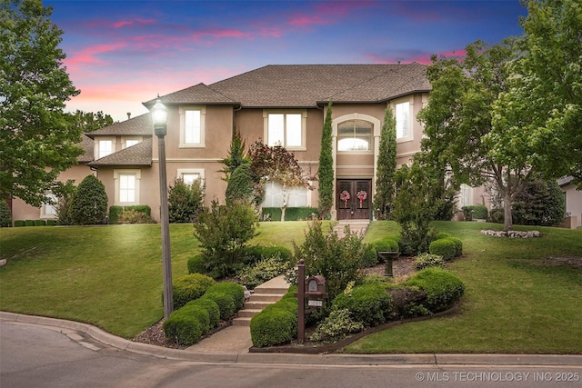 view of front of house featuring a yard