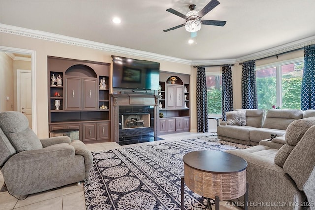 6215 E 86th Pl, Tulsa, OK 74137 - tiled living room with built in shelves, ornamental molding, a tile fireplace, and ceiling fan