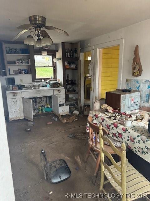 interior space featuring ceiling fan