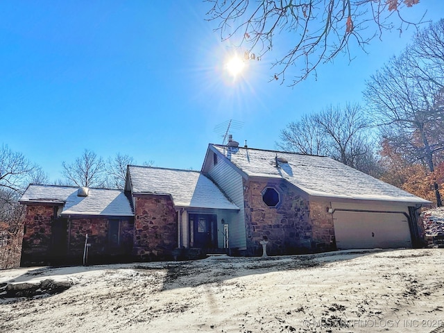 view of front of property with a garage