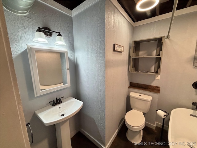 bathroom featuring toilet