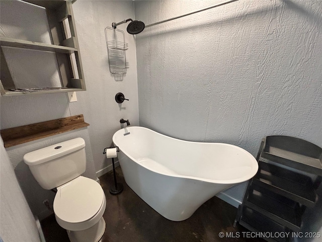 bathroom with toilet and a bath