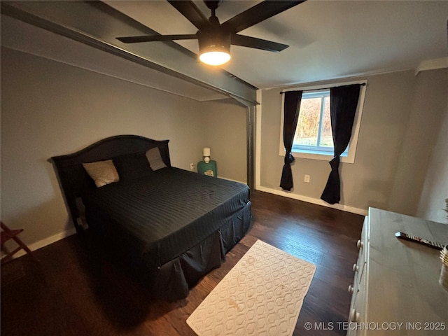 bedroom featuring dark wood-type flooring and ceiling fan