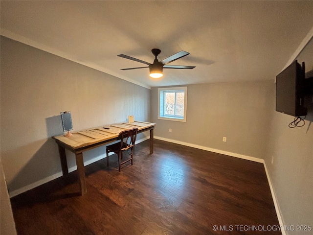 dining area with dark hardwood / wood-style floors and ceiling fan