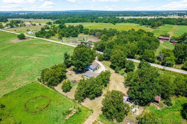 birds eye view of property featuring a rural view