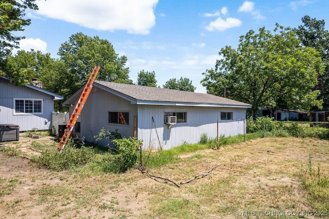 view of home's exterior with cooling unit