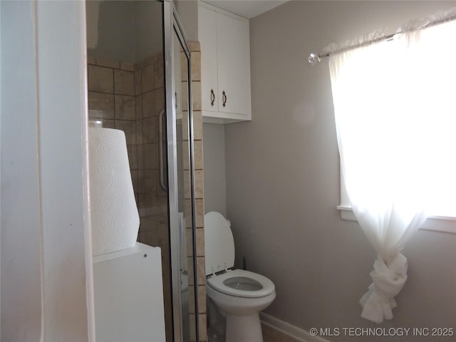 bathroom featuring toilet