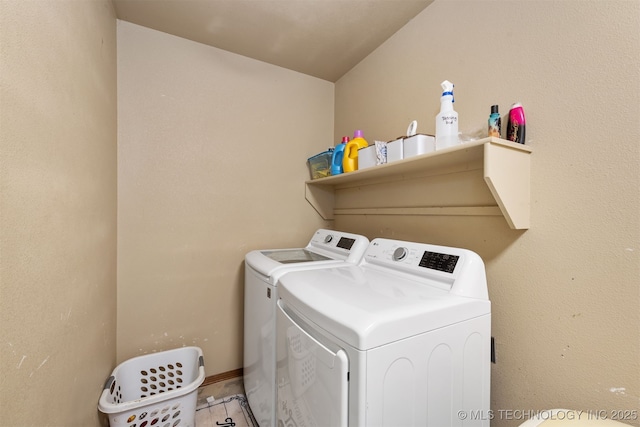 washroom with washer and clothes dryer