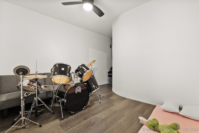 misc room featuring dark hardwood / wood-style flooring and ceiling fan