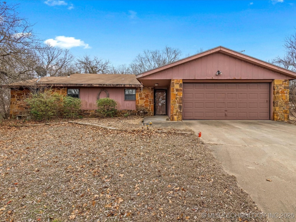 single story home with a garage