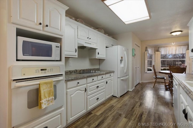 kitchen with white cabinetry, dark wood-type flooring, and white appliances