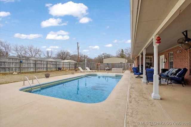 view of swimming pool featuring an outdoor living space and a patio