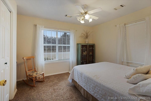 carpeted bedroom with ceiling fan