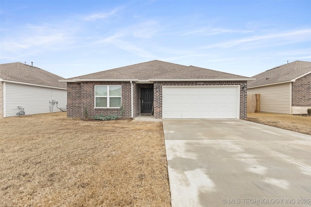 ranch-style house with a garage and a front yard