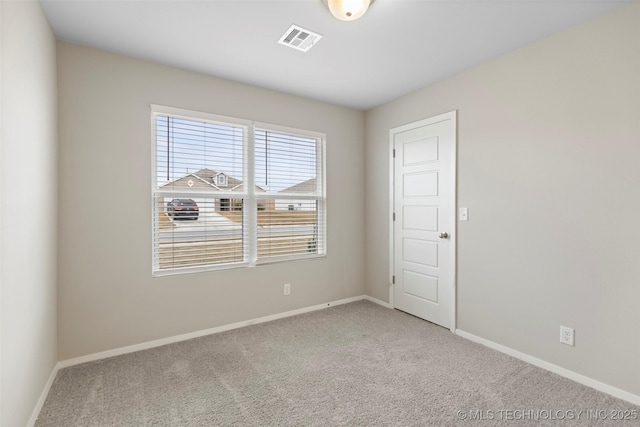 view of carpeted spare room