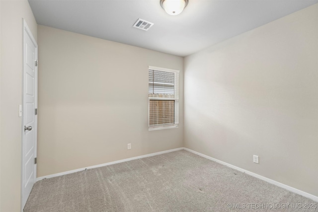 unfurnished room featuring carpet floors