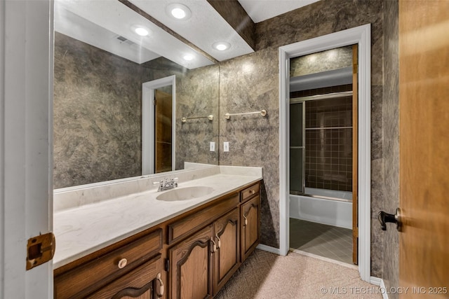 bathroom with vanity, combined bath / shower with glass door, and tile patterned floors