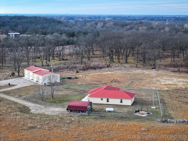 birds eye view of property featuring a rural view