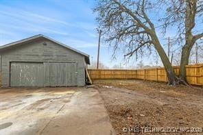 view of outbuilding with a garage