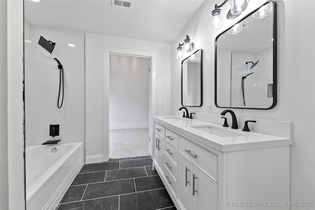 bathroom with vanity, shower / tub combination, and tile patterned floors