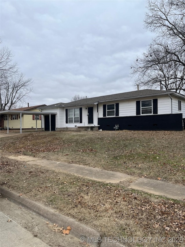 view of front of house with a carport