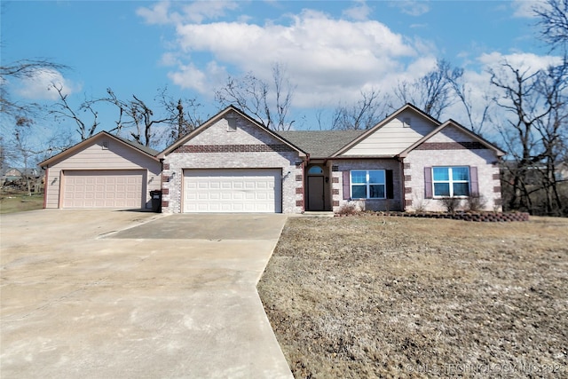 view of front of house with a garage and a front yard