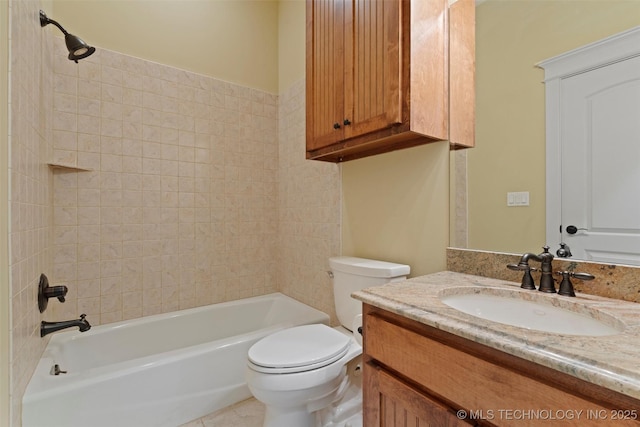 full bathroom featuring tiled shower / bath combo, vanity, tile patterned flooring, and toilet