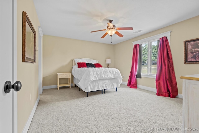 bedroom featuring ceiling fan and carpet flooring