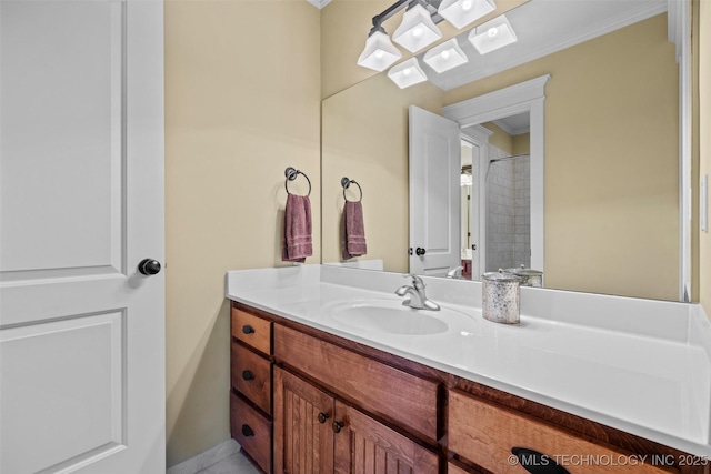 bathroom featuring vanity and crown molding