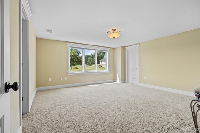 unfurnished bedroom featuring light colored carpet