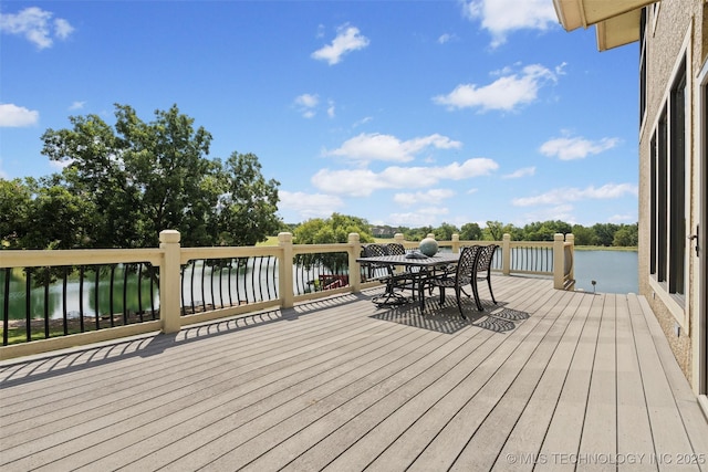 deck featuring a water view