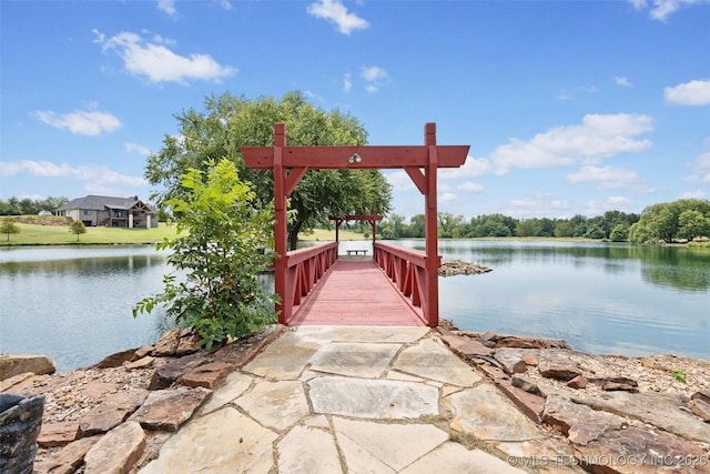 view of dock with a water view