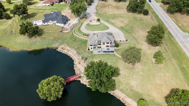 bird's eye view with a water view