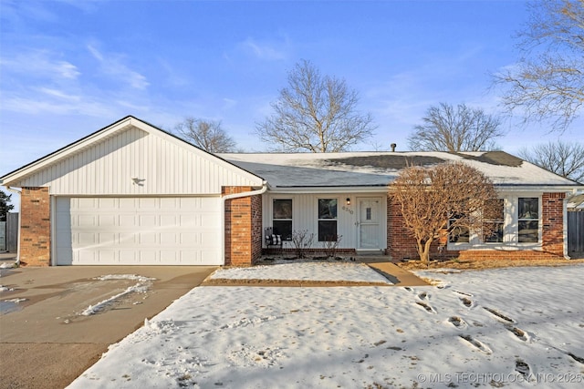 single story home featuring a garage and covered porch