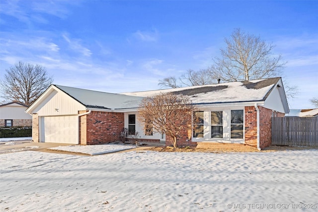 single story home with a garage