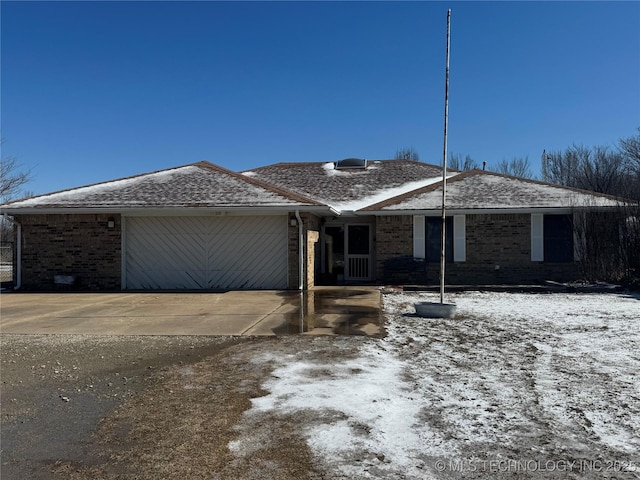 single story home with a garage