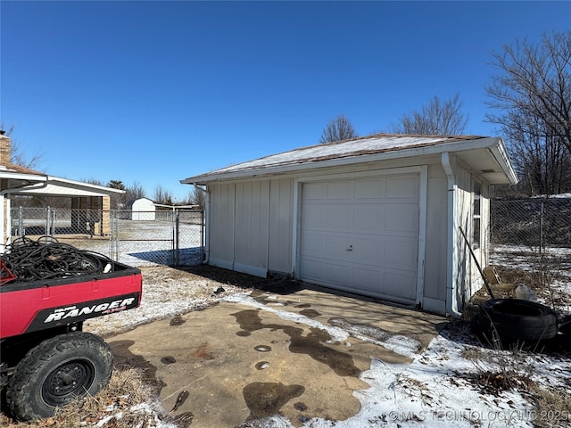 view of snow covered garage