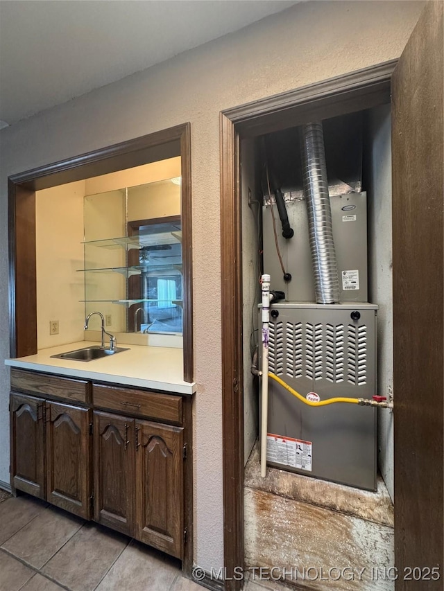 utility room featuring sink