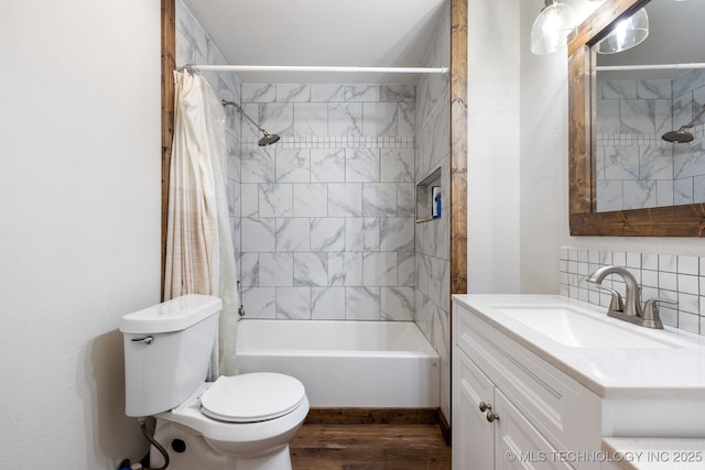 full bathroom featuring toilet, shower / tub combo, vanity, hardwood / wood-style flooring, and backsplash