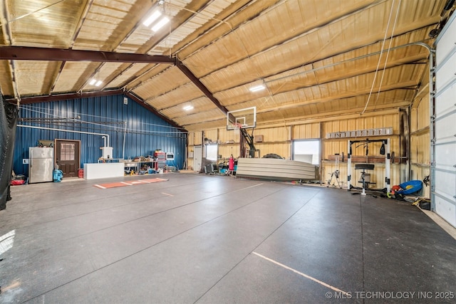 9501 S 4170th Rd, Claremore, OK 74017 - garage with freestanding refrigerator
