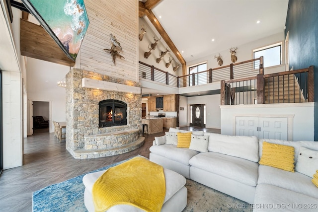 9501 S 4170th Rd, Claremore, OK 74017 - living area featuring high vaulted ceiling, beamed ceiling, a fireplace, and recessed lighting