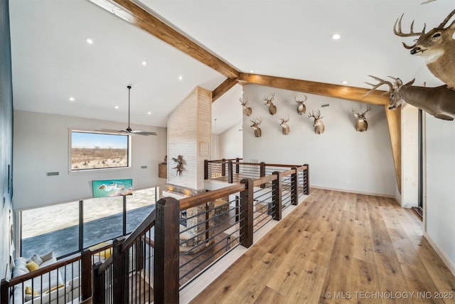 9501 S 4170th Rd, Claremore, OK 74017 - corridor featuring an upstairs landing, beam ceiling, light wood-style floors, baseboards, and recessed lighting